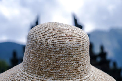 Rear view of person wearing hat