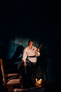 Portrait of man sitting on chair