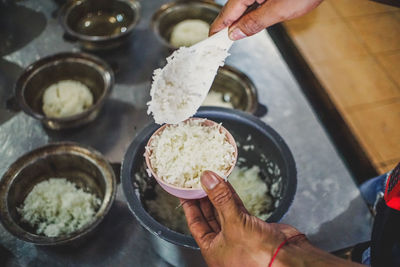 High angle view of person preparing food