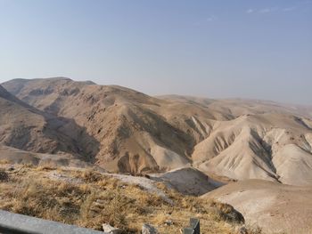 Scenic view of desert against clear sky