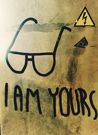 Close-up of text on wall