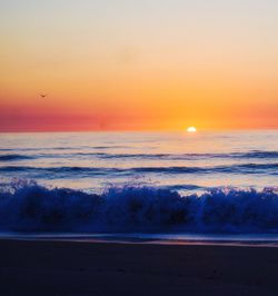 Scenic view of beach during sunset