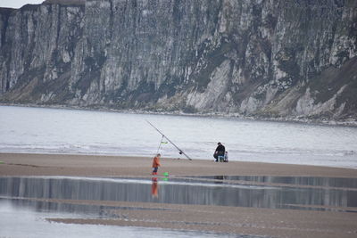 Full length of girl walking at beach