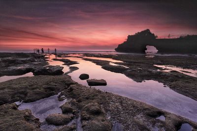 Scenic view of sea against sky at sunset