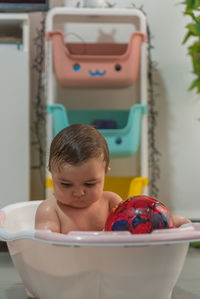 High angle view of cute baby boy in water 