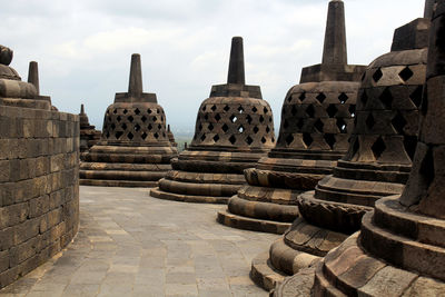 Stupas of temple against sky