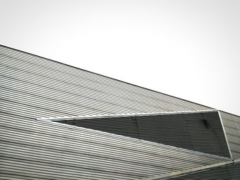 Low angle view of modern building against clear sky