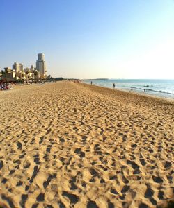 Scenic view of sea against clear blue sky