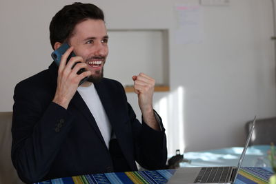 Young man using mobile phone