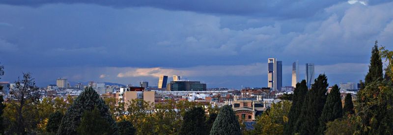 Panoramic view of modern buildings against sky