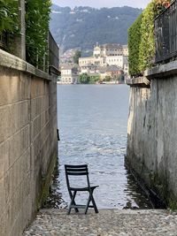 Scenic view of river by buildings