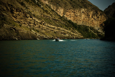 Scenic view of sea and mountains