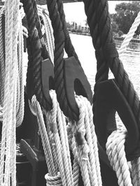 Close-up of rope tied on harbor