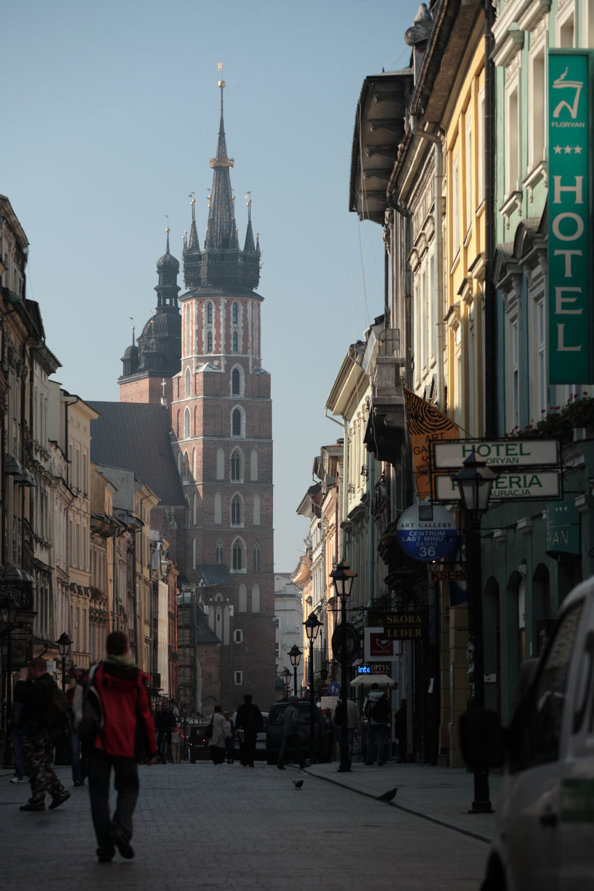 PEOPLE WALKING IN CITY STREET