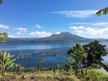 Scenic view of sea against blue sky