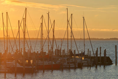 Boats moored at harbor