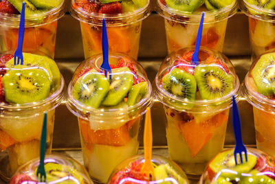 Close-up of multi colored candies in glass jar