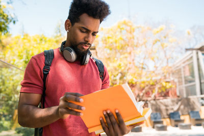 Young man using mobile phone