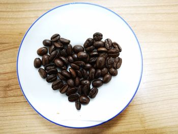 High angle view of coffee beans on table