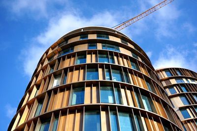 Low angle view of modern building against sky