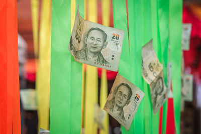 Close-up of paper currency on decor