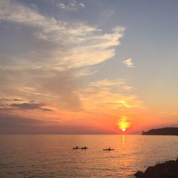 Scenic view of sea at sunset