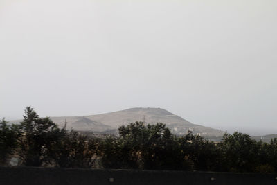 Scenic view of mountains against clear sky