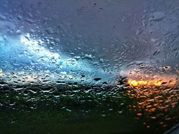 Close-up of water drops on glass window