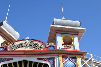 Low angle view of building against blue sky