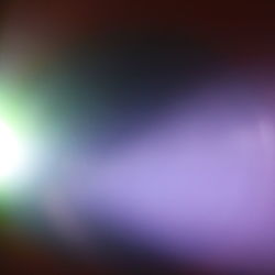 Defocused image of illuminated lights at night