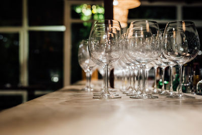 Luxury table settings for fine dining with and glassware, beautiful blurred background. 