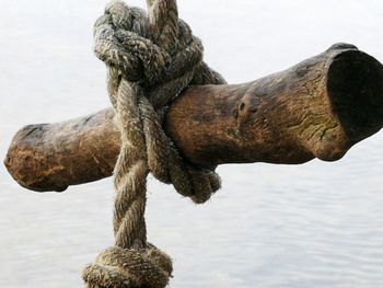 Close-up of rope tied on metal