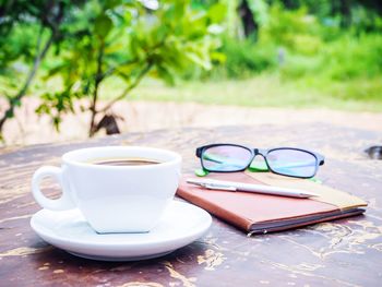 Close-up of coffee cup on table