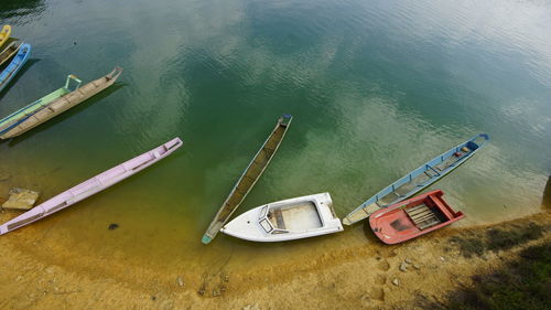 High angle view of fishing boats moored in sea