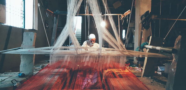 Portrait of man working in factory