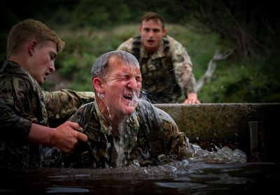 Young men in water