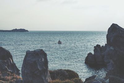 Scenic view of sea against clear sky