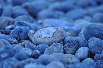 Close-up of pebbles on beach