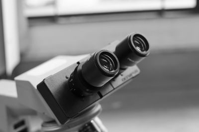 Close-up of microscope on table