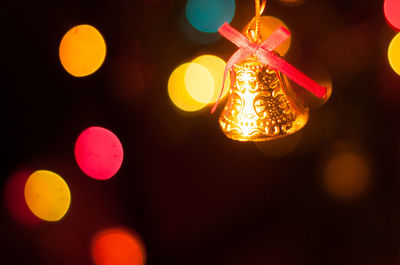 Close-up of illuminated christmas tree at night