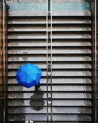 Close-up of blue umbrella