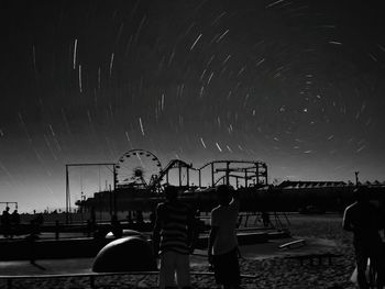 View of illuminated people at night