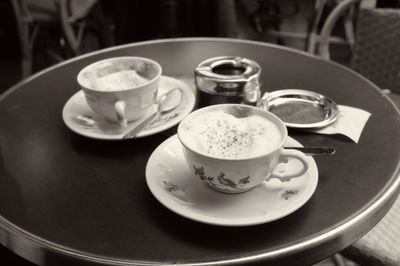 Close-up of cappuccino on table