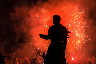 Group of people watching fire crackers