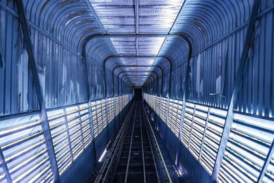 Low angle view of escalator in building