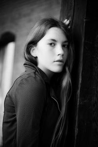 Portrait of a beautiful young woman looking away