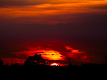 Scenic view of dramatic sky during sunset