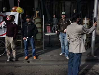 Men standing outdoors