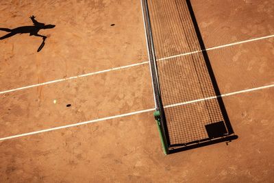 High angle view of tennis court on sunny day