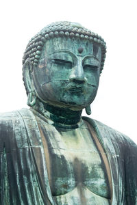 Statue of buddha against clear sky
